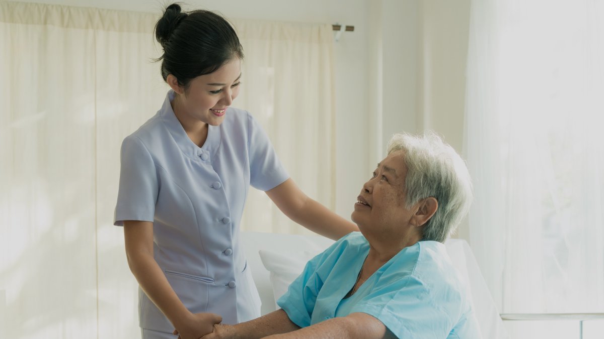 a-nurse-helping-an-elderly-how-to-get-a-canadian-work-permit-from-malaysia