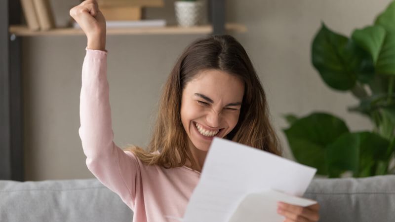 a young woman celebrating | York University