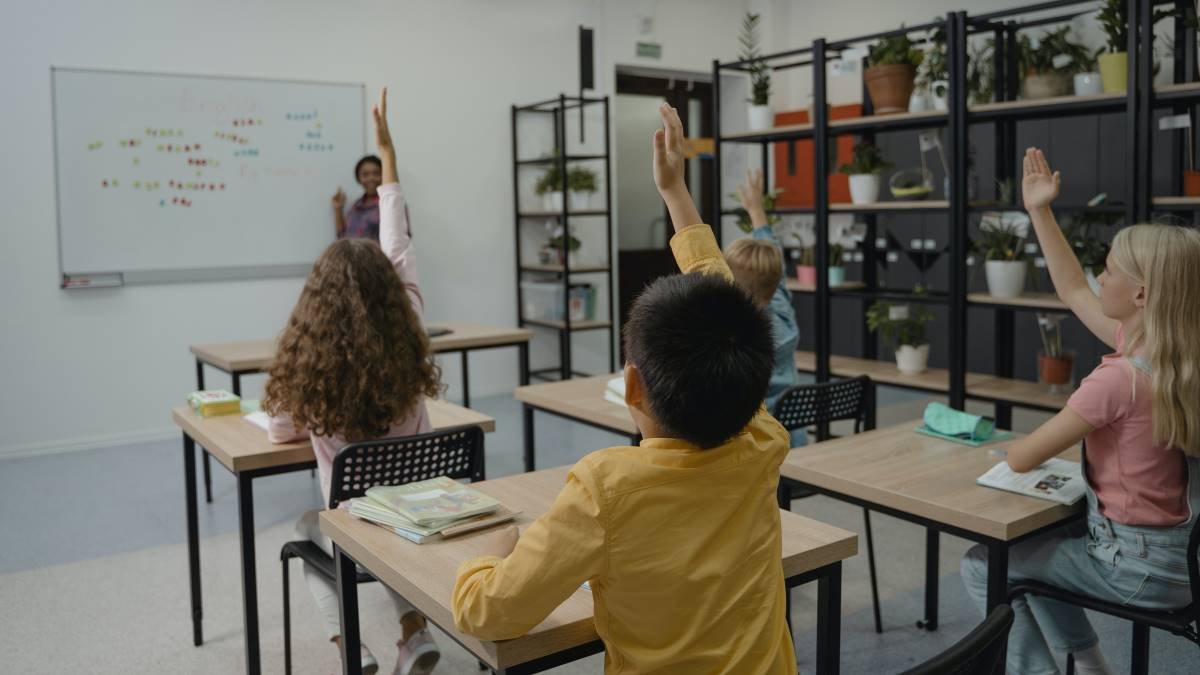 teacher-in-a-classroom-with-students-how-to-get-a-job-in-canada