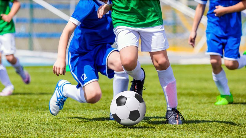 students-playing-football-simon-fraser-university